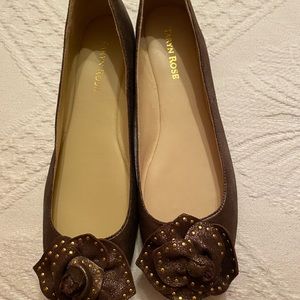 Taryn Rose bronze flats with rose embellishment. Size 9.5 medium